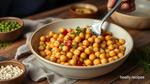 Mixing Chickpeas for a Flavorful Salad